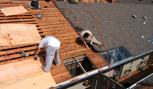 Certified VB Roofers Inspecting Plywood Deck and Replacing Damaged Wood Sheathing on Residential Roof